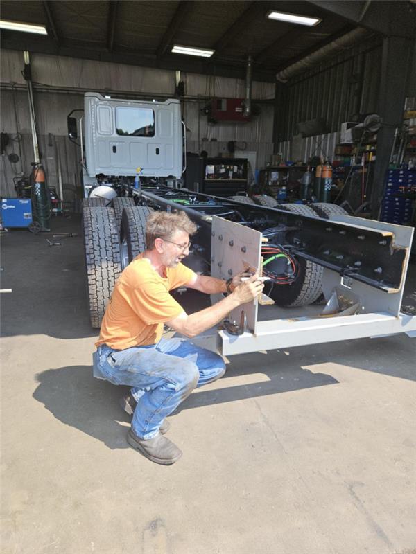 Man working on flatbed